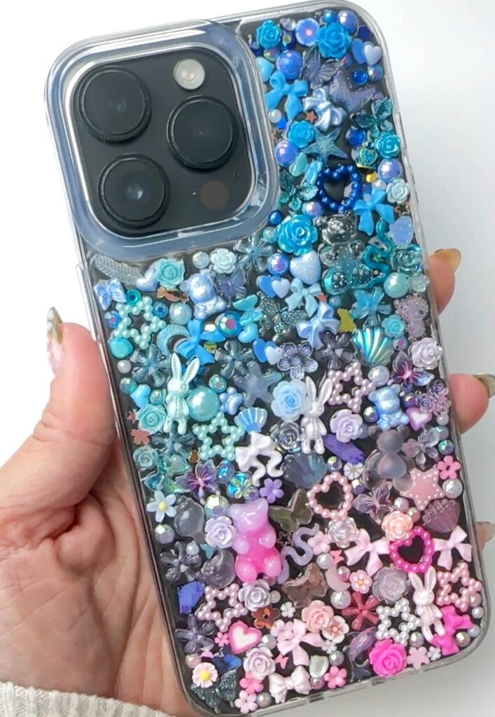 junk phone case covered in charms