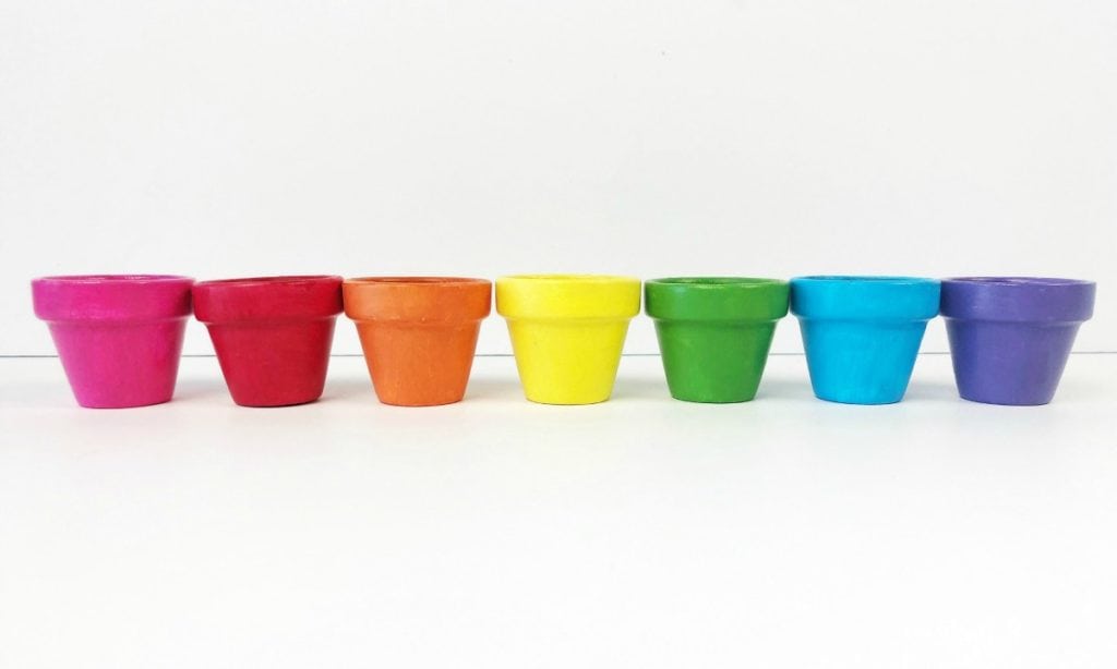 A rainbow of painted flower pots