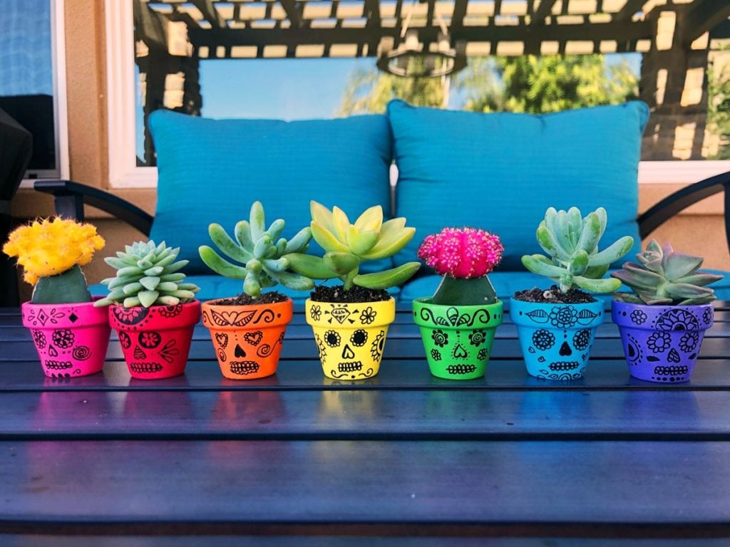 Rainbow Halloween sugar skull table centerpiece